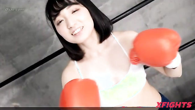 Akibacom - KOD-02 - Charming Asian girl beats up a guy in a boxing match.