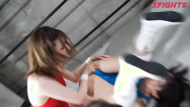 Akibacom - BW-62 - Brutal fight in the ring between two Asian girls