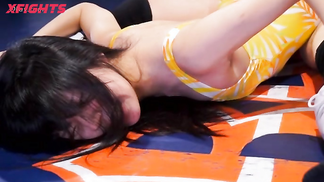 Akibacom - BWM-09 - Guy brutally defeats two sexy Asian girls in wrestling