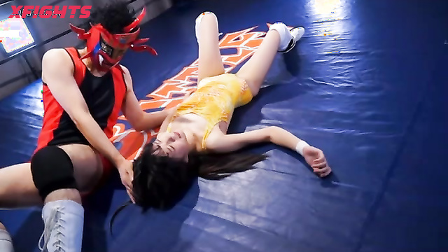 Akibacom - BWM-09 - Guy brutally defeats two sexy Asian girls in wrestling