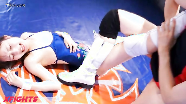 Akibacom - BWM-09 - Guy brutally defeats two sexy Asian girls in wrestling