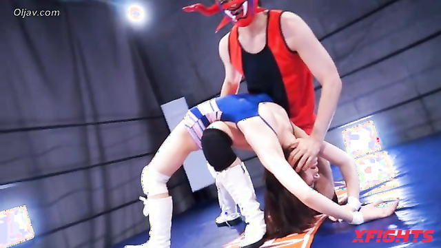 Akibacom - BWM-09 - Guy brutally defeats two sexy Asian girls in wrestling