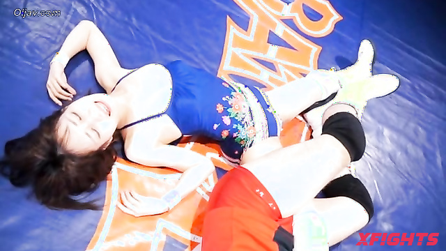 Akibacom - BWM-09 - Guy brutally defeats two sexy Asian girls in wrestling