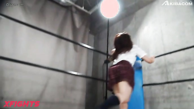 Akibacom - BCMC-44 - Japanese girls dressed as schoolgirls staged a brutal wrestling match