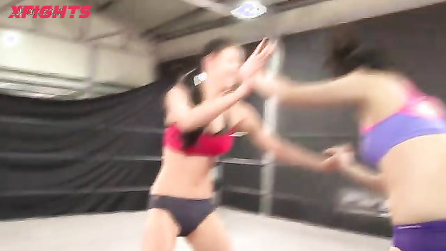 Akibacom - TCW-01 - Two cute Japanese girls test their strength in the ring
