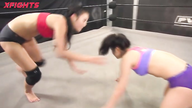 Akibacom - TCW-01 - Two cute Japanese girls test their strength in the ring