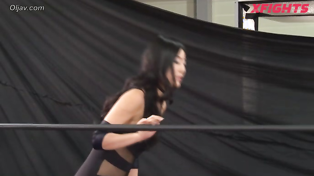 Akibacom - TCW-01 - Two cute Japanese girls test their strength in the ring