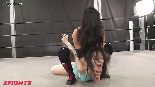 Akibacom - TCW-01 - Two cute Japanese girls test their strength in the ring