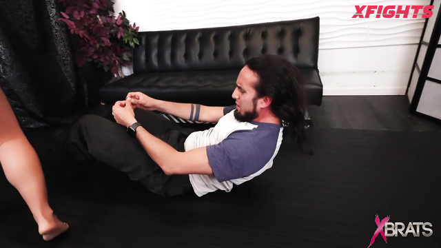 XBrats - Macy Nikole vs Acro Suave - Strong beautiful legs domination