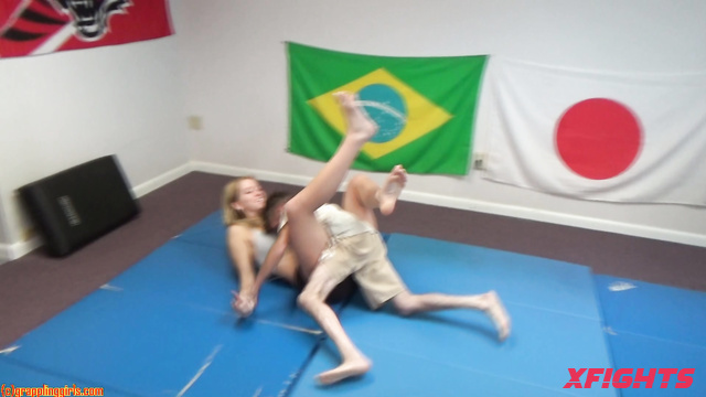 Grappling Girls in Action - GGAmazons164 - Blonde hard dominates guys in wrestling