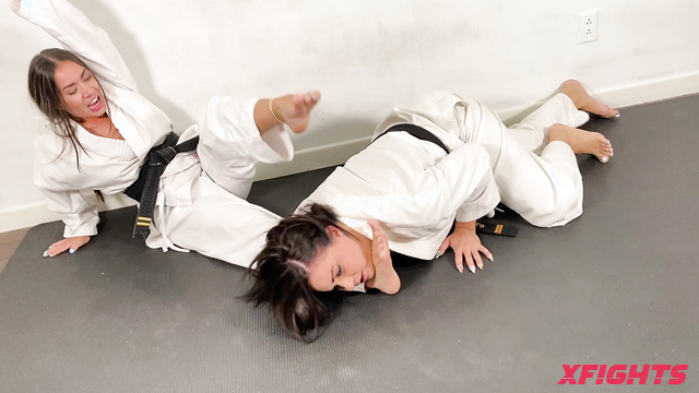Foot Mode Girl Fights - Two sexy brunettes have a karate fight with their feet