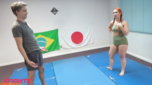 Grappling Girls in Action - Ggtestofstrength14 Red head girl & guy measure their strength