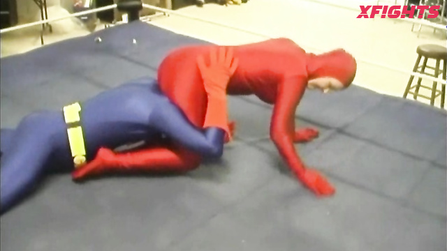Sexy Fighting Women - Red & Atomic - Girl harshly dominates and beats guy in the ring