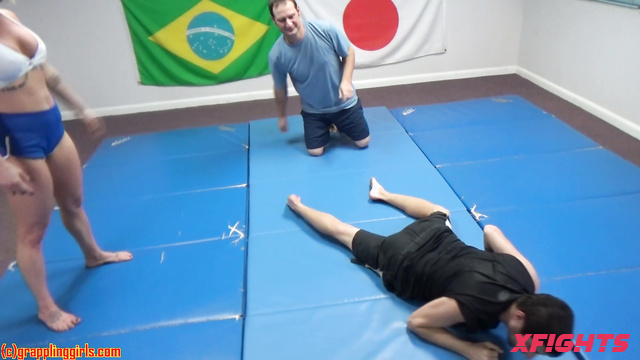 Grappling Girls in Action - Sexy blonde dominates a guy harshly