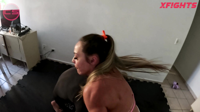 Challenge Sports - Feet Lady Vs Rick - A muscular woman wrestles with a guy in the kitchen