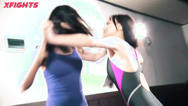 Team Wizard - ACFMW-1b - A fierce fight between two Asian girls