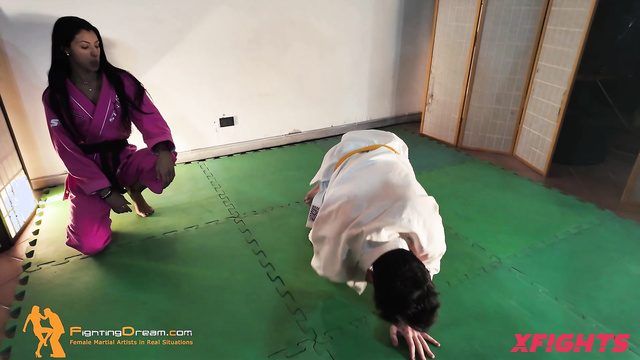 Fightingdream Video Store - Debby & Marco - A girl practices karate moves on a guy