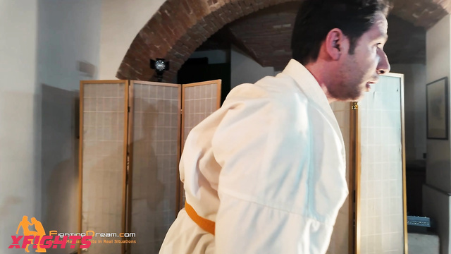 Fightingdream Video Store - Debby & Marco - A girl practices karate moves on a guy
