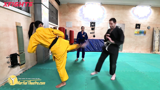 Martial Fetish - Alison, Samy & Marco - Brunettes practice karate kicks on a guy
