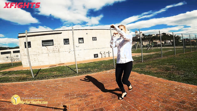 Martial Fetish - Kata & Marco - Blonde in heels practices karate kicks