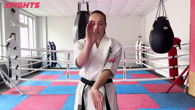 Mixfights - A red-haired girl trains karate