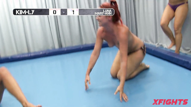 Fighting Dolls - Kim-Ly vs Luna & Mary-Ann - Topless fight between cute girls on the mats
