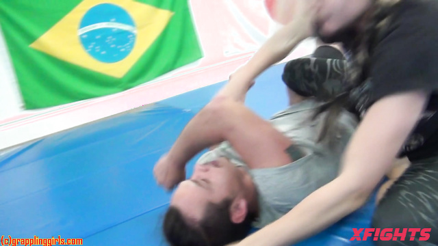 Grappling Girls In Action - Anthony - A blonde and a guy are figuring out who is stronger