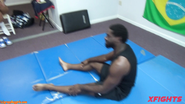 Grappling Girls In Action - Strong sexy girl in bikini dominates black guy
